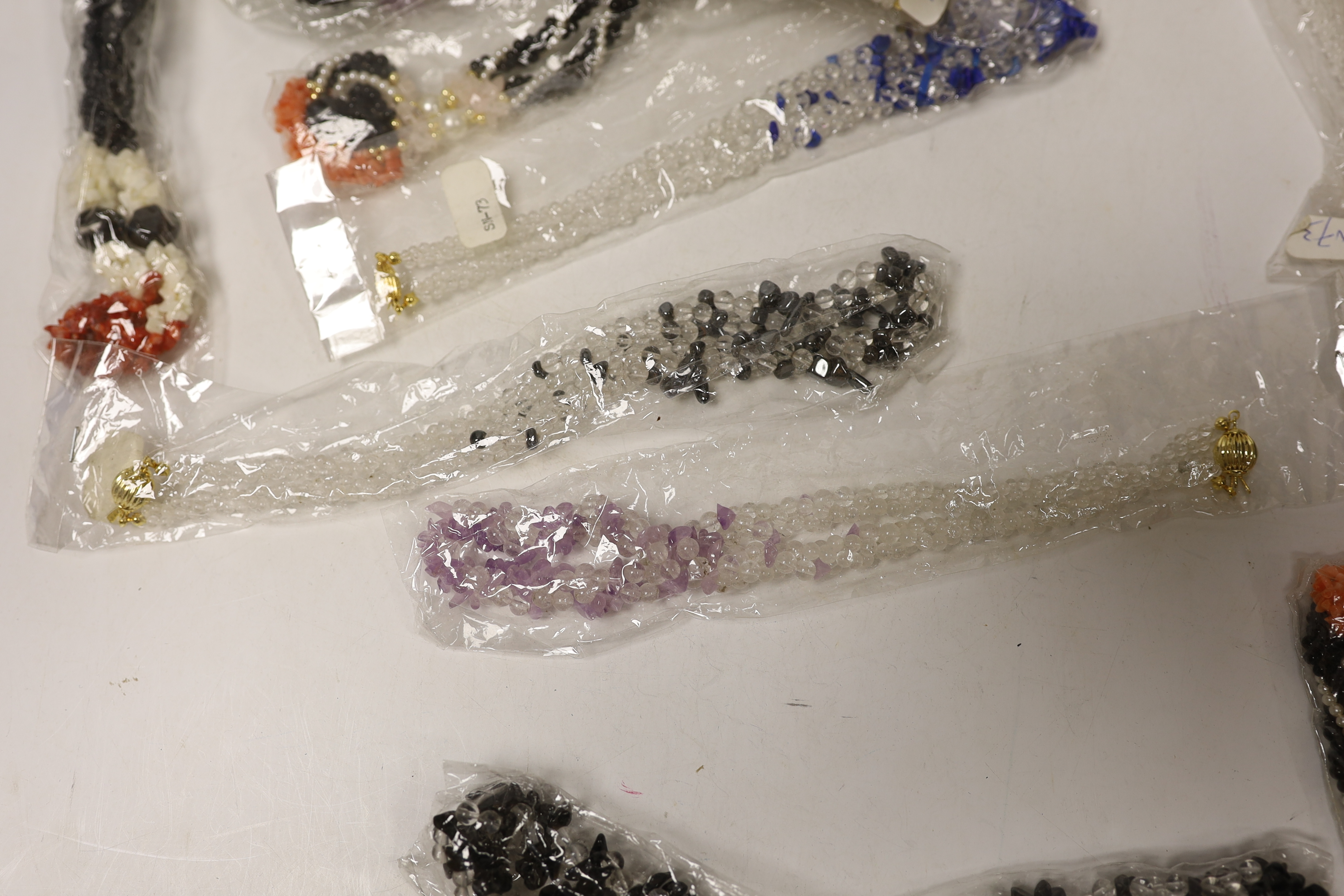 Approximately thirty assorted modern bead necklaces.